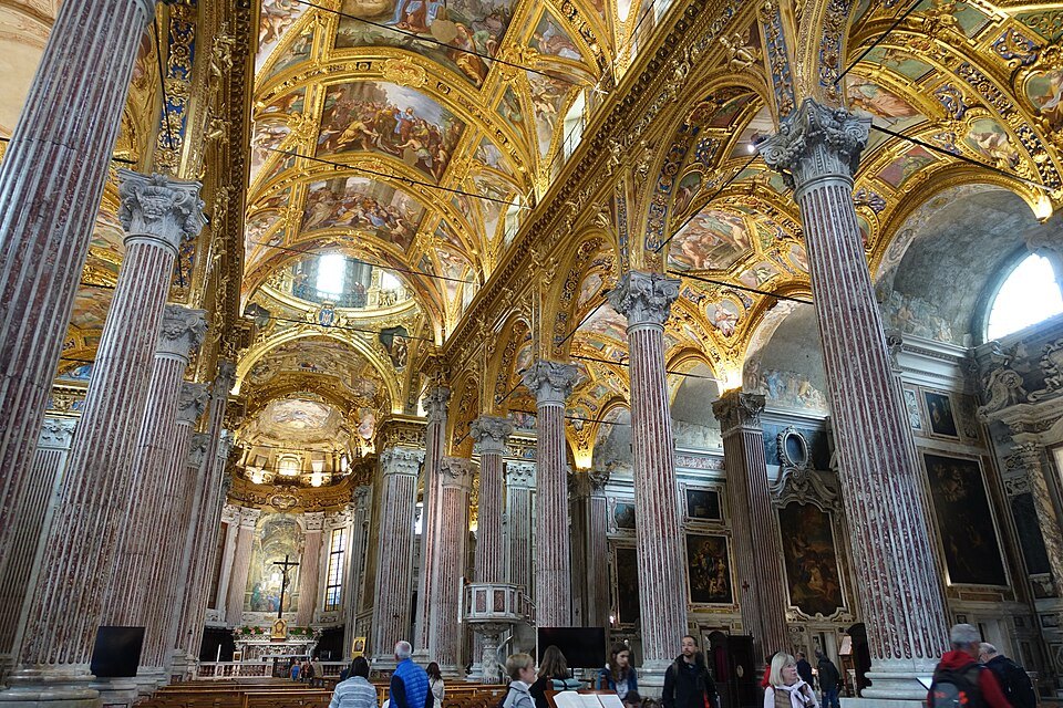 The nave of the Annunziata under its painted vault and gilded piers