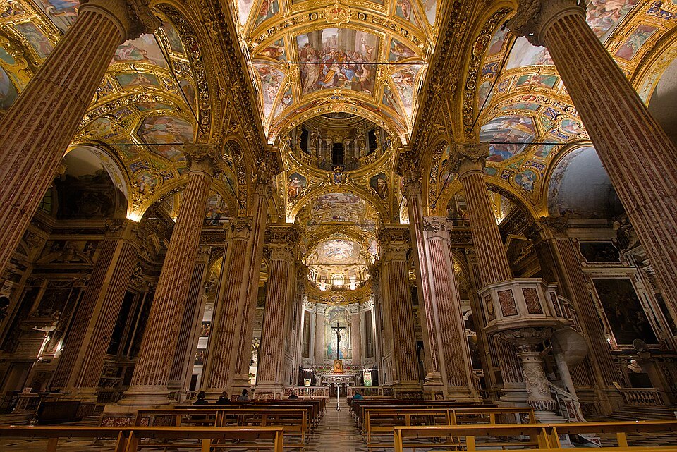 Gilded piers and painted vaults in the Annunziata's aisle