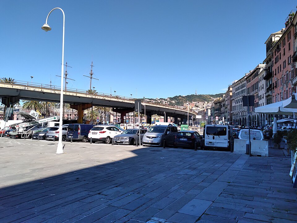 The quay beside the aquarium, with the old town rising behind
