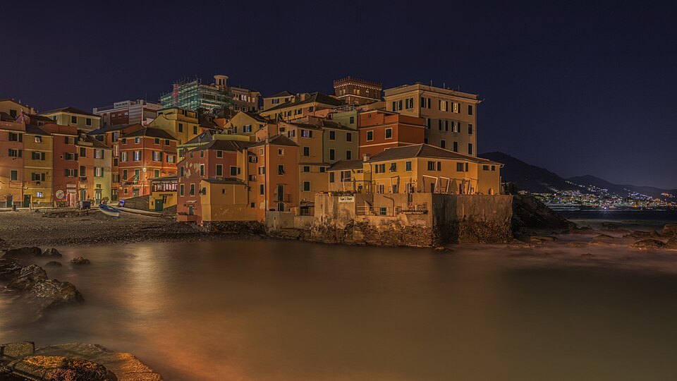 Boccadasse at night, the cove lit and the houses in shadow