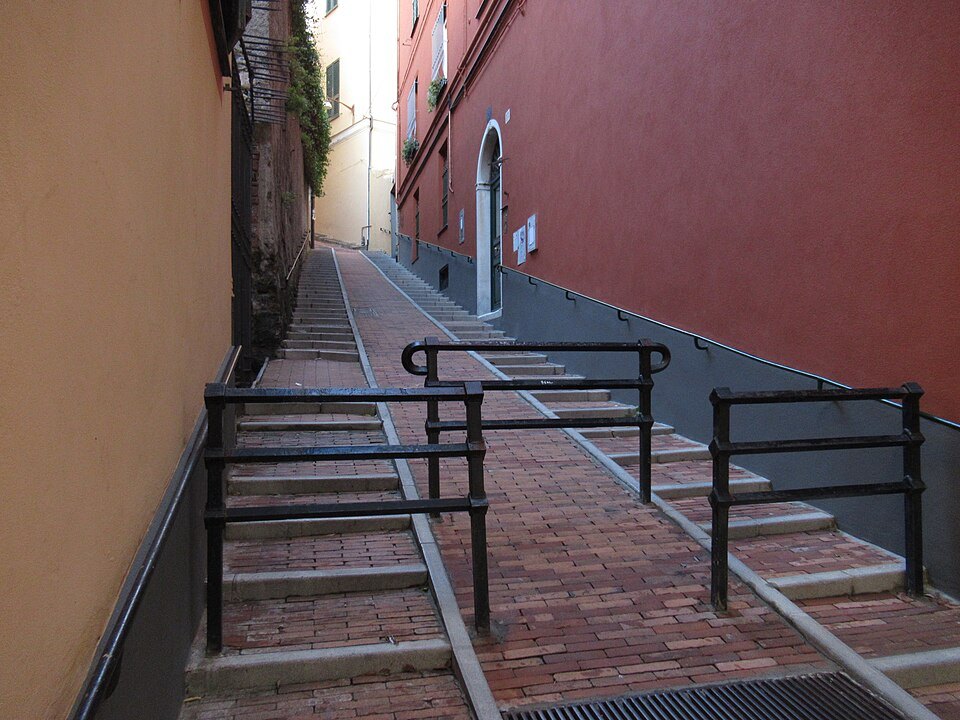 The brick-paved salita climbing to the Spianata di Castelletto, with its handrails