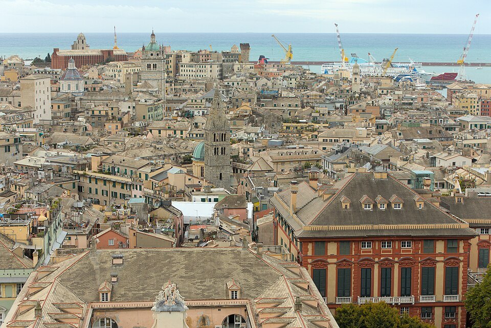 Roofs of the old town from the Belvedere Montaldo, with the port and the cranes beyond