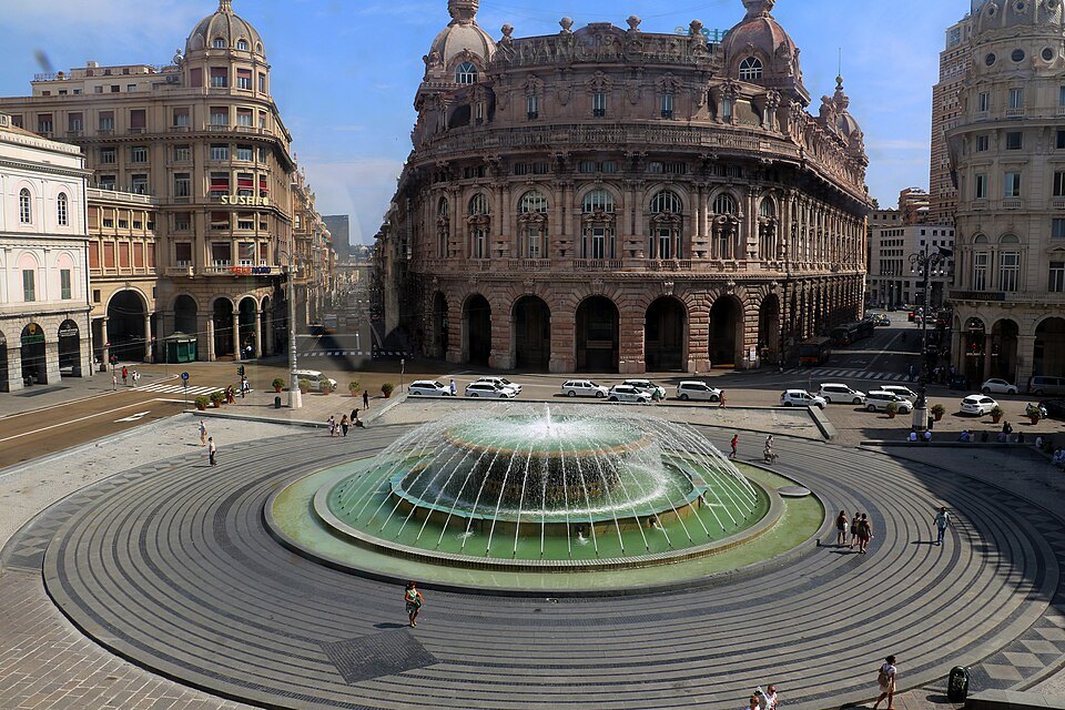 The bronze fountain at the center of Piazza De Ferrari, ringed by its steps