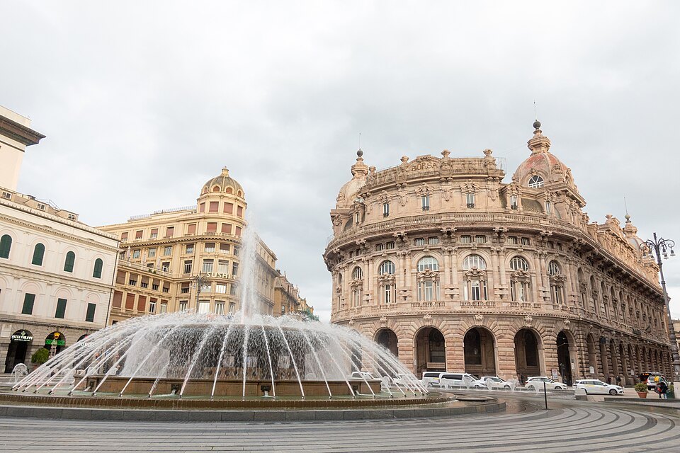 The fountain playing in front of the domed former stock exchange