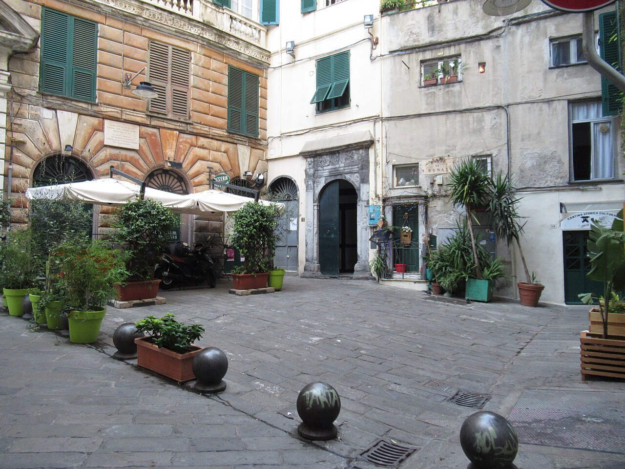 Piazza San Donato, bollards and plants in a quiet corner of the old town