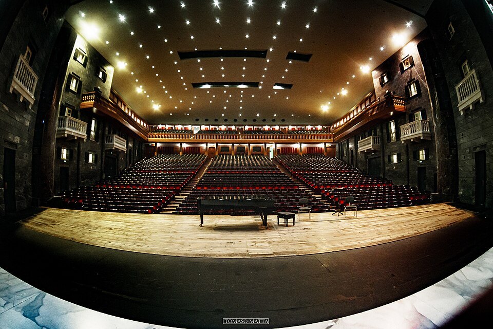 The auditorium of the Carlo Felice from the stage, tiers rising at the back