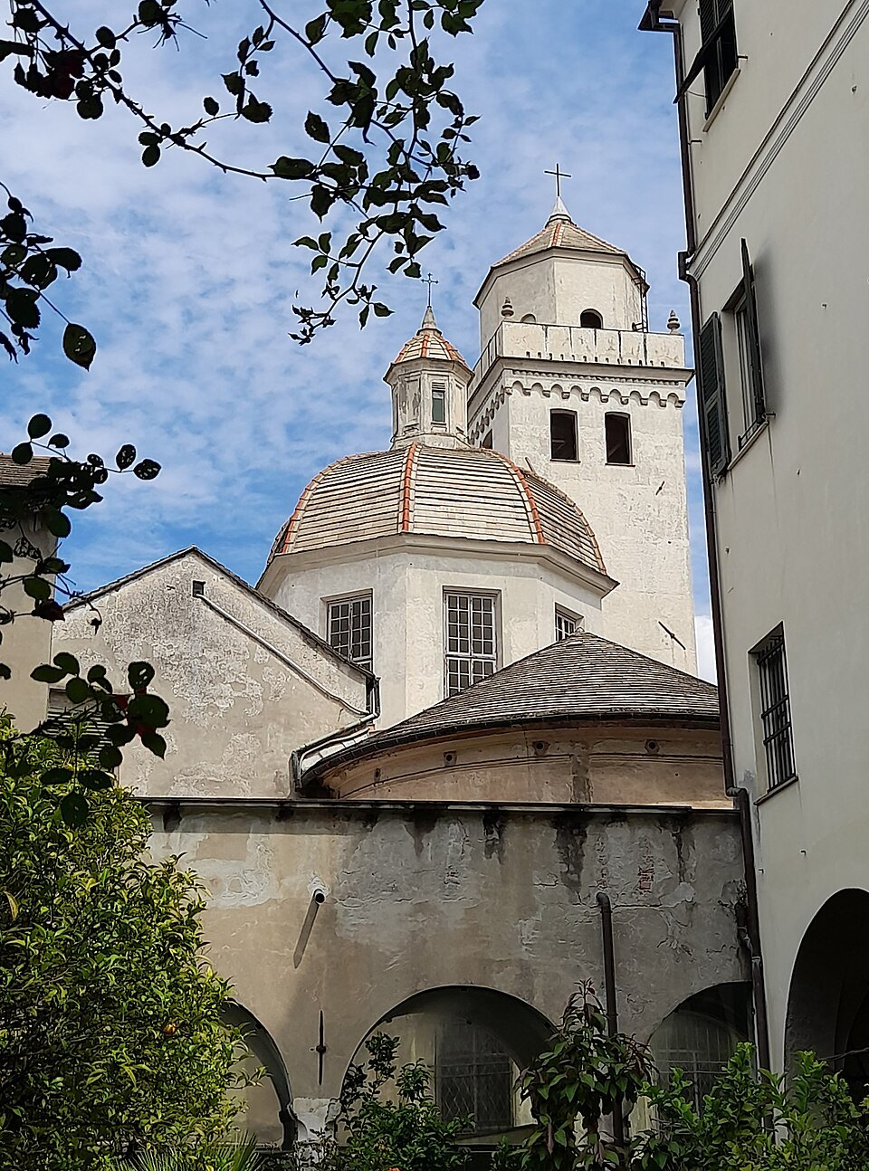 Santa Maria di Castello, its tower and dome above the lanes
