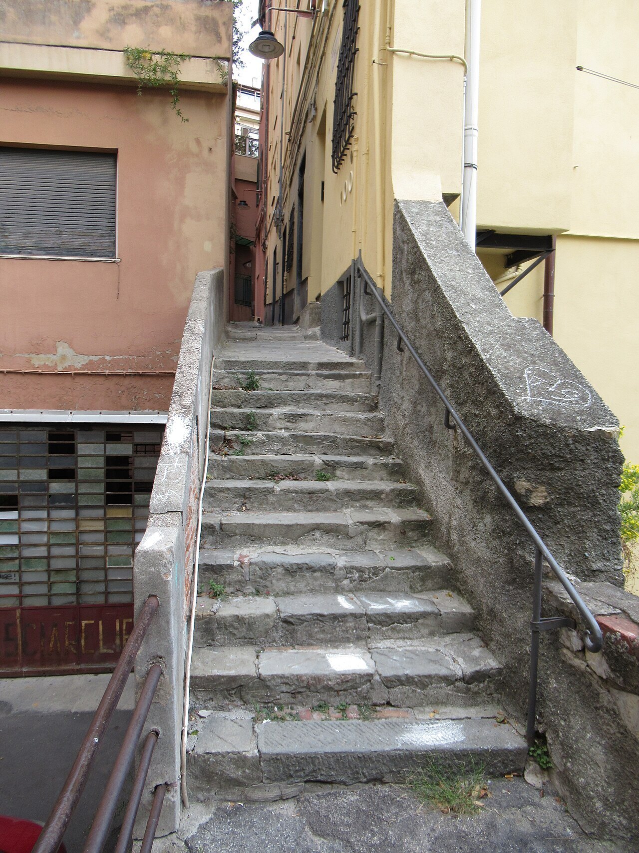 A stepped lane in the old town, closed between two high walls