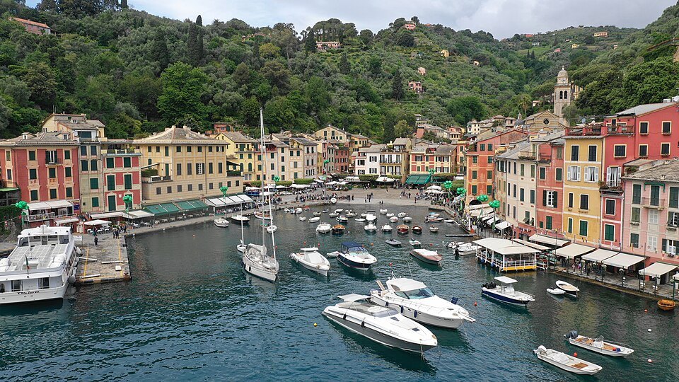 The harbour at Portofino, boats moored under the painted houses