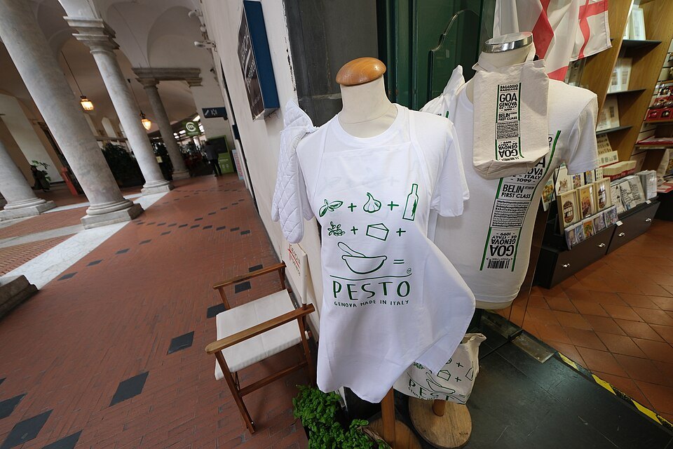 A pesto shop in the old town, aprons and shirts hung by the door