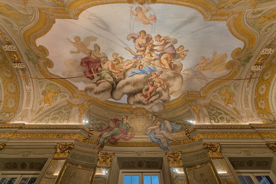 The painted ceiling of the Hall of Mirrors, cherubs above the cornice