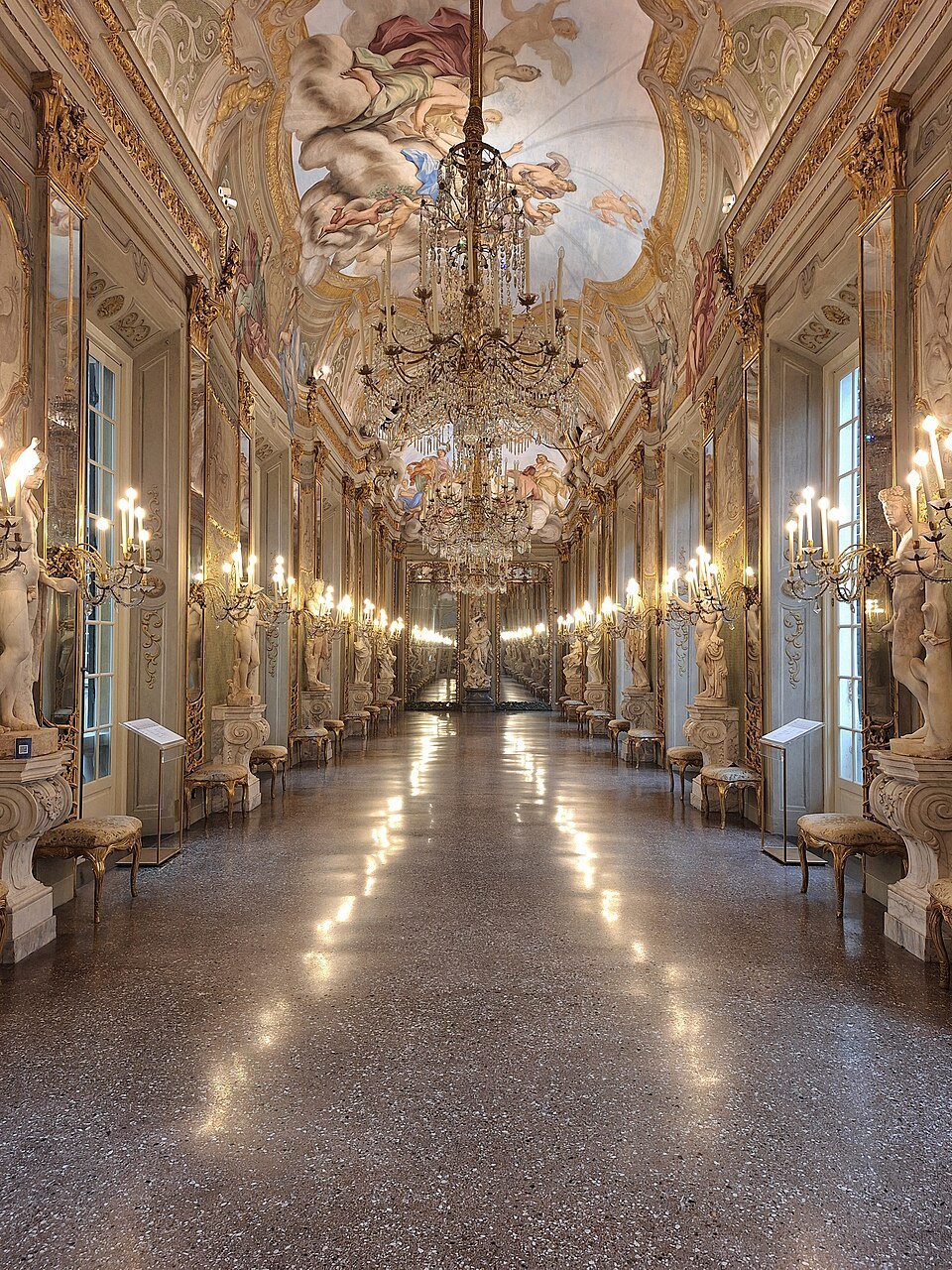The Galleria degli Specchi at the Palazzo Reale, mirrors down both walls