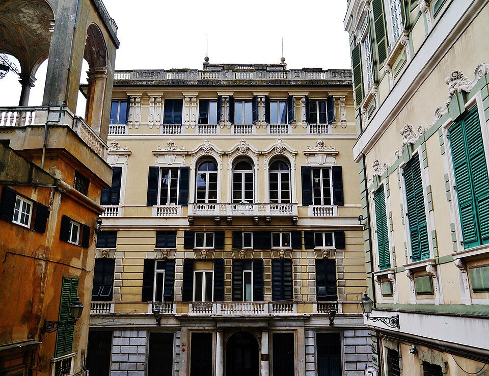 Via Balbi with its palace fronts, shutters and shops at street level
