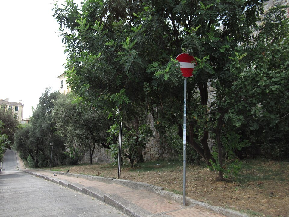 The green slope below Porta Soprana, where the quarter was cleared