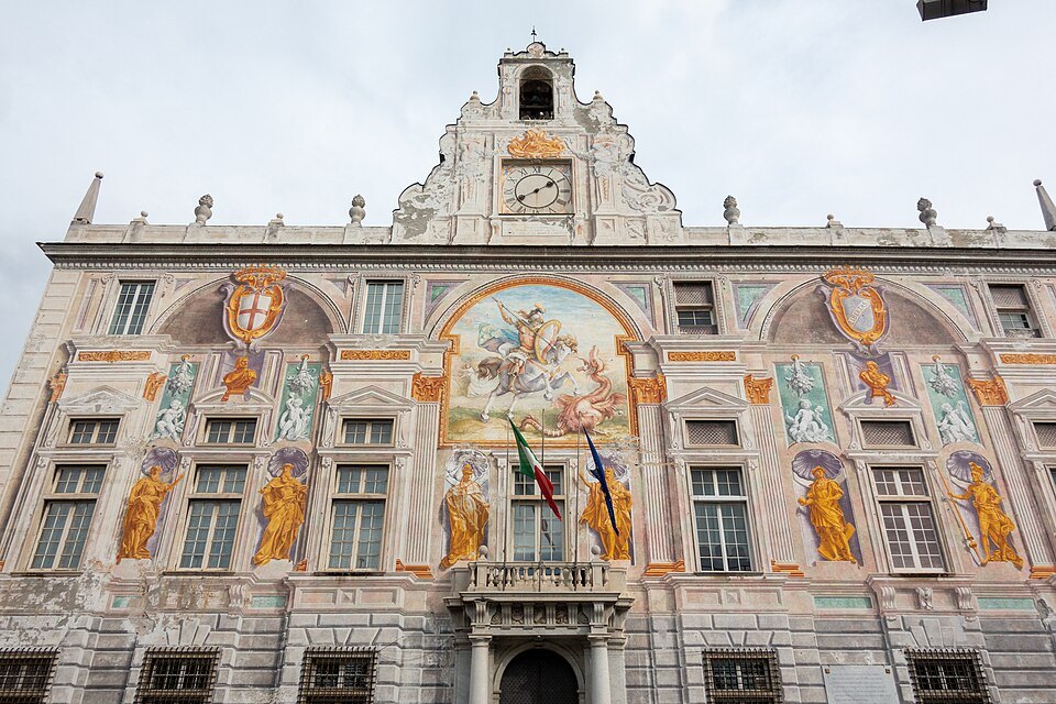 The frescoed front of Palazzo San Giorgio at the old port