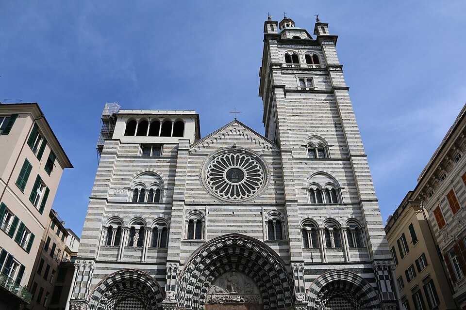 San Lorenzo's striped front, the rose window set between banded courses