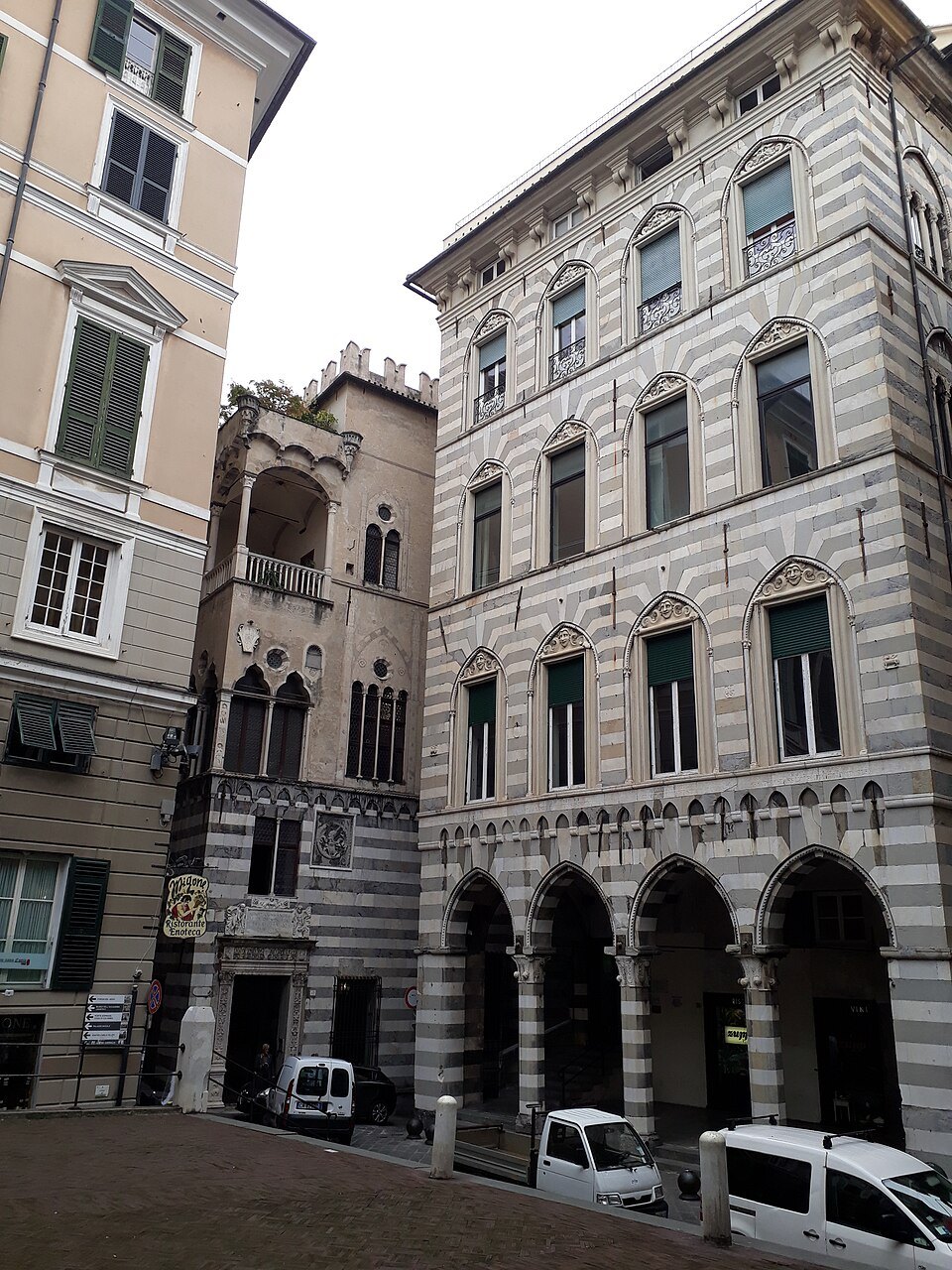 Palazzo Doria Lamba's banded loggia, arcades open along the ground floor