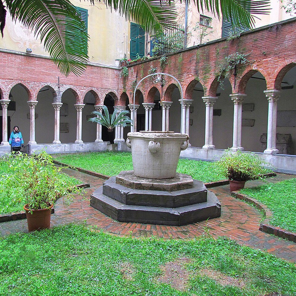 The little cloister beside San Matteo, its well ringed by striped arcades