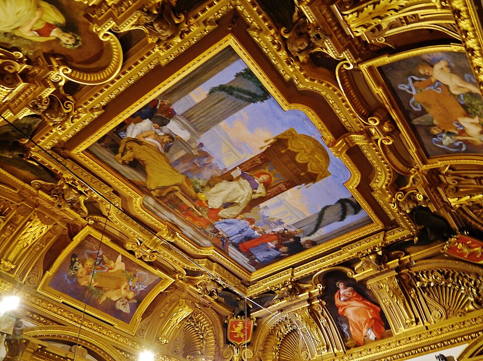 A painted and gilded ceiling in the Strada Nuova museums